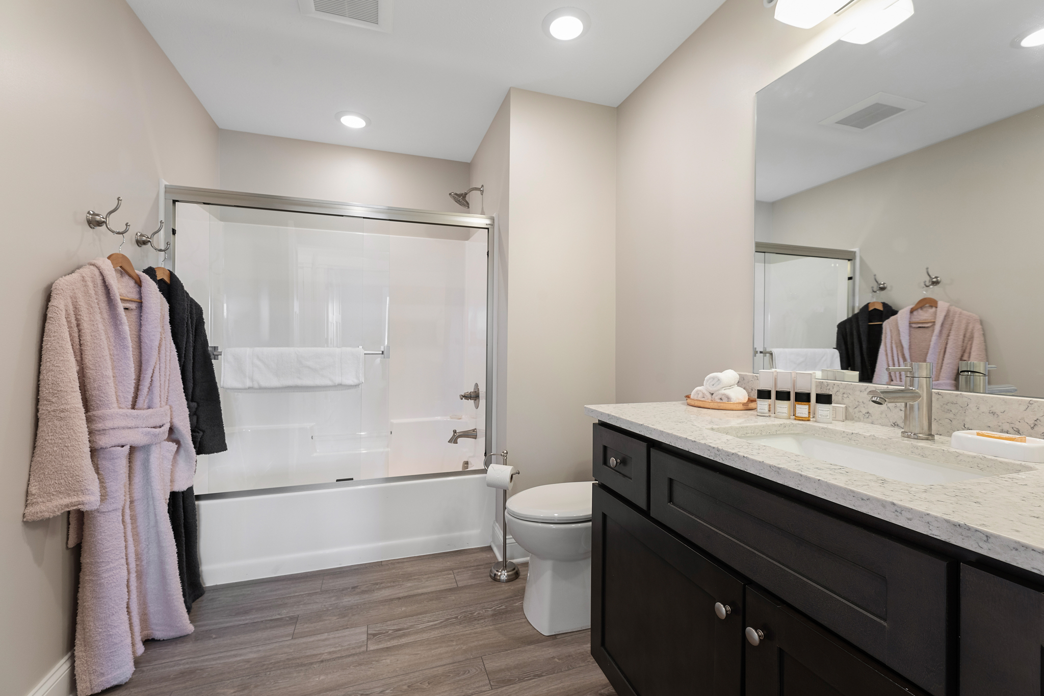 Modern and elegant bathroom at 539 Bay Street condo in Traverse City with stylish fixtures and clean design